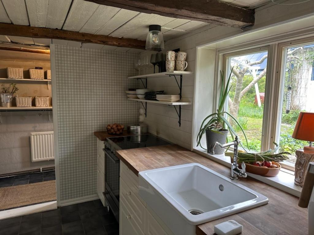 Millans Dockhus Villa Onslunda Esterno foto